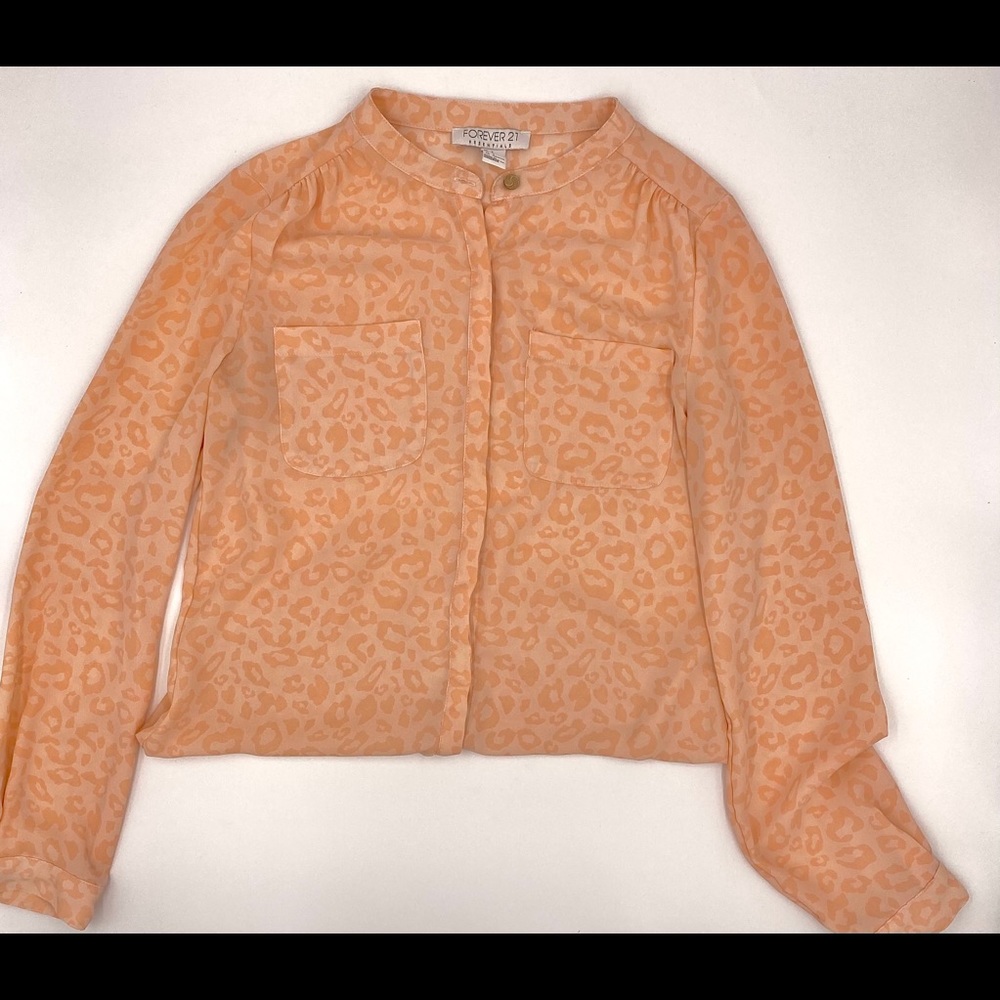 Cute light orange button-down blouse!